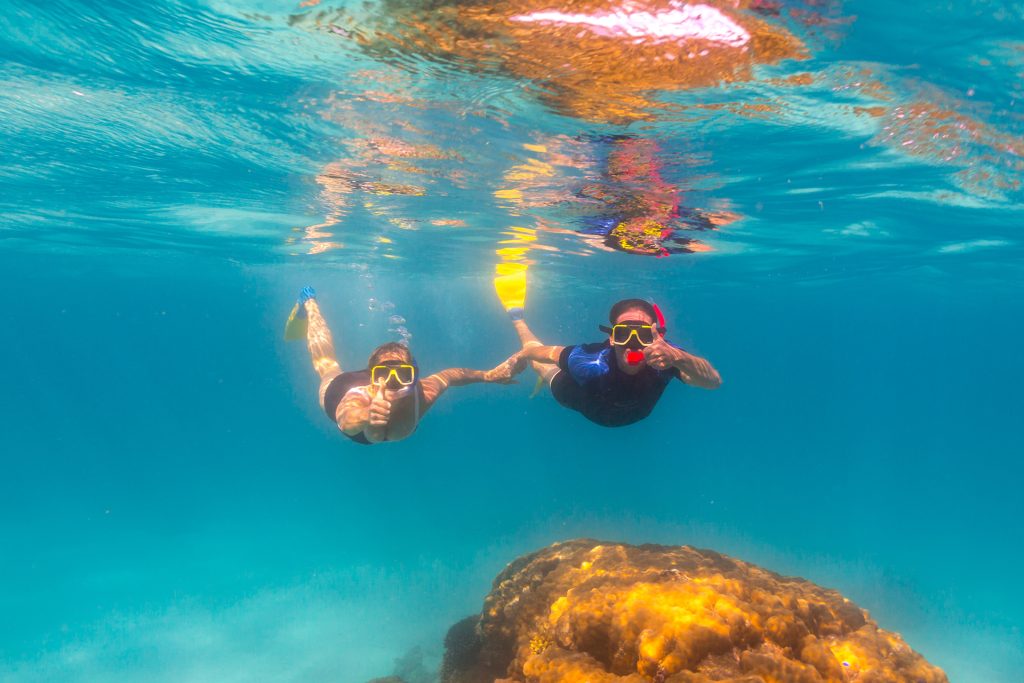 Couple snorkelling in the Ningaloo Marine Park. Photo credit: Tourism Western Australia