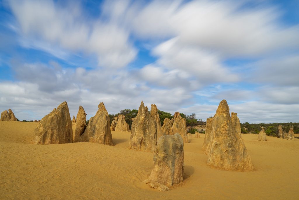 Famed for its unique limestone formations, the magical Pinnacles Desert in Nambung National Park is another must-see.